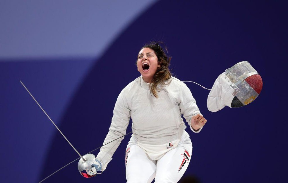 Fonte BBC News — Foto: Nada Hafez comemora vitória nas quartas de final de esgrima;  a egípcia revelou que competiu nos Jogos grávida de sete meses