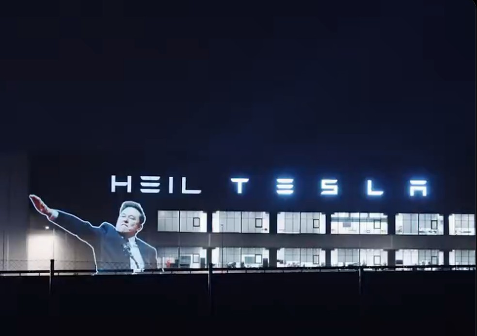 Ativistas projetaram a imagem de Musk na fábrica da Tesla — Foto: Reprodução/X