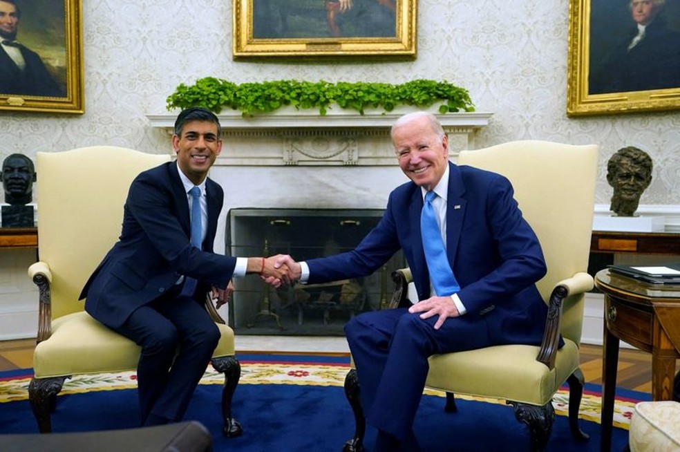 Rishi Sunak e Joe Biden durante encontro na Casa Branca, nos EUA — Foto: Reuters