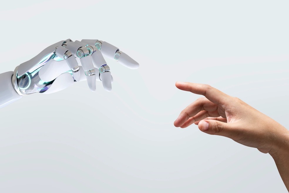 Inteligência artificial e humano — Foto: Freepik