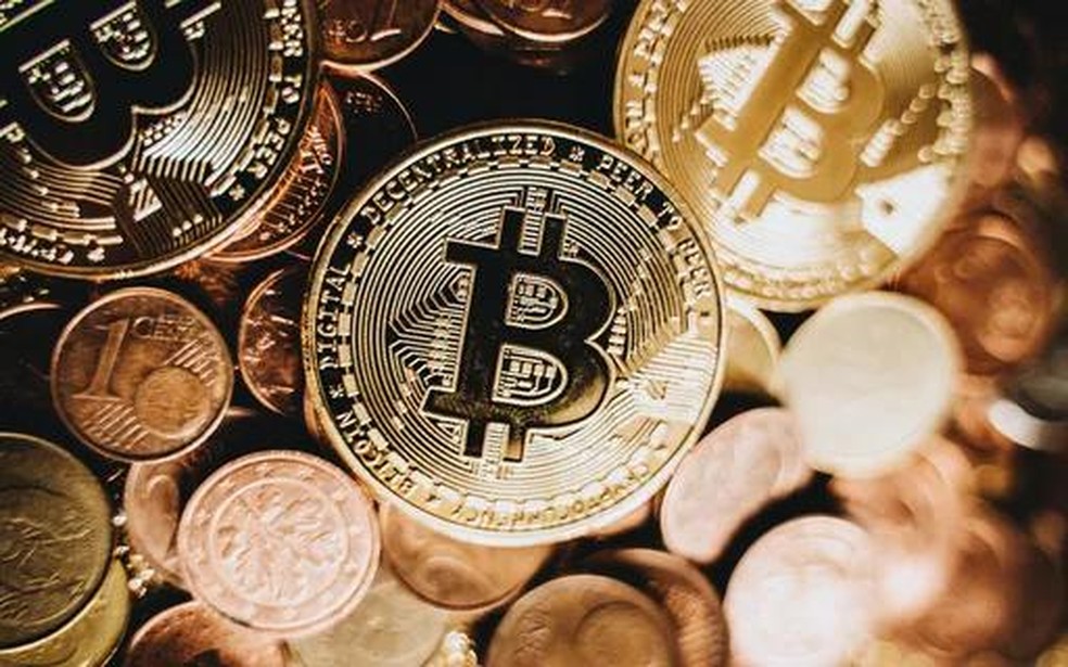 Ações de empresas de criptomoedas caem após Binance interromper saques de bitcoin por horas — Foto: Getty Images