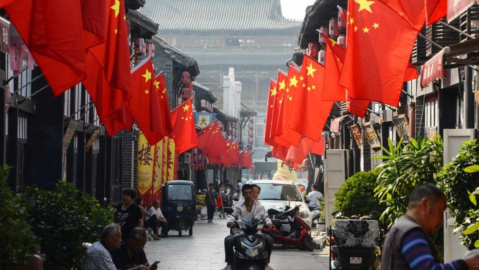 Ações da China fecham em baixa com redução do otimismo e enfraquecimento do iuan — Foto: Getty Images