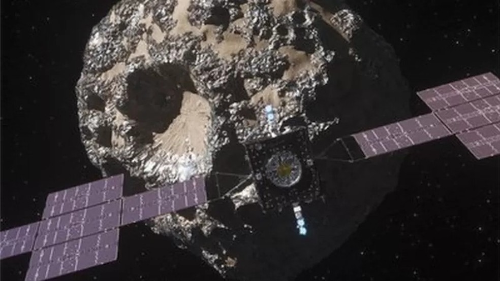 Impressão artística da sonda Psyche da Nasa se aproximando do asteroide 16 Psych — Foto: NASA via BBC News