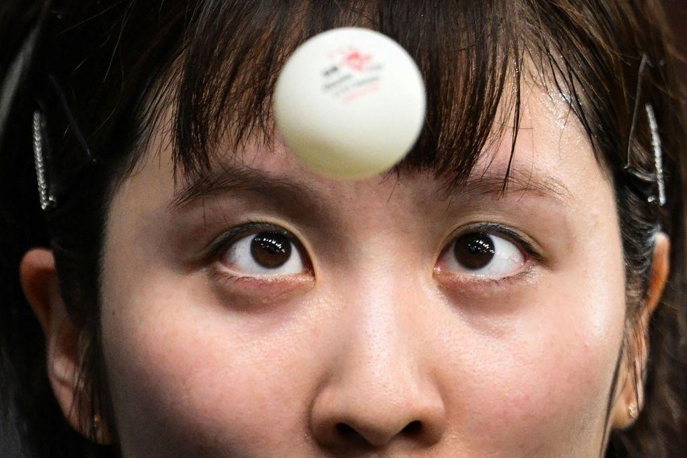 Fonte da BBC News — Foto: Miu Hirano, do Japão, fica de olho na bola durante uma partida de tênis de mesa